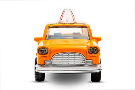 白色背景上的黄色出租车玩具复古汽车模型.孤立的照片